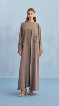 NELLIE ABAYA