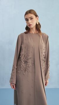 NELLIE ABAYA